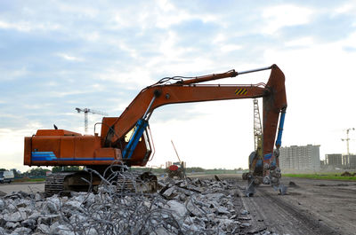 Construction site on field against sky