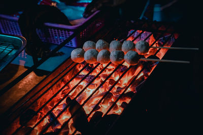 High angle view of candles on barbecue