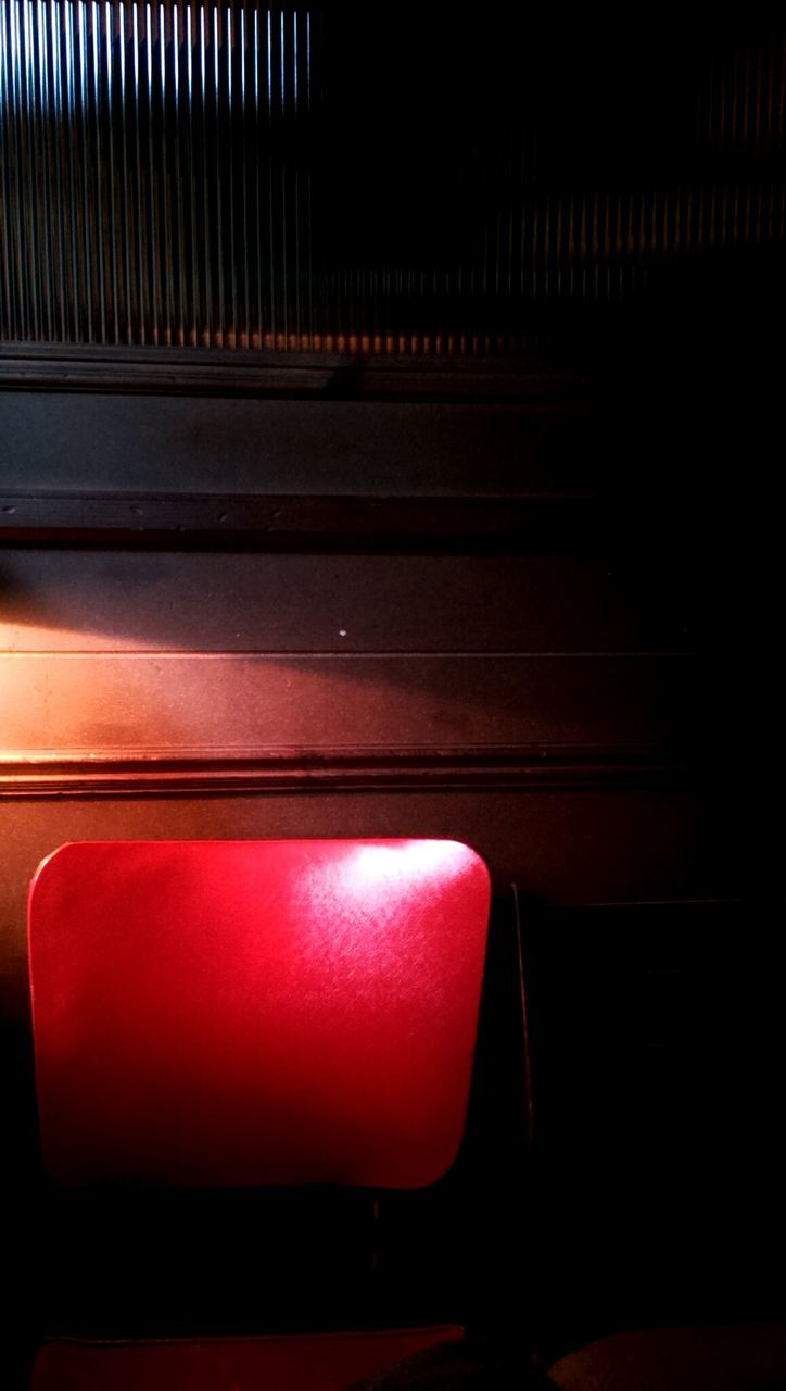 indoors, red, chair, empty, absence, seat, no people, wall - building feature, close-up, window, metal, still life, table, illuminated, furniture, home interior, sunlight, day, glass - material, built structure