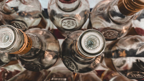 High angle view of bottles in jar