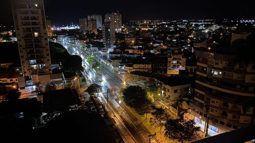 High angle view of illuminated buildings at night