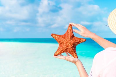 Close-up of starfish on beach