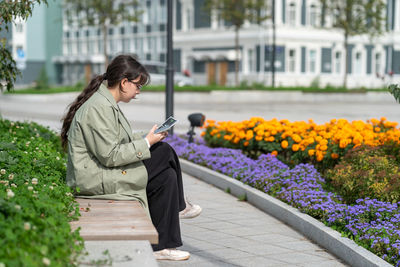 Young woman using phone