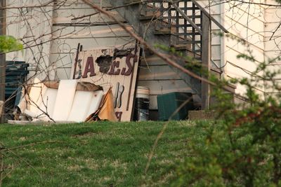 Abandoned building on field