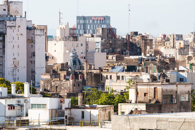 High angle view of buildings against clear sky