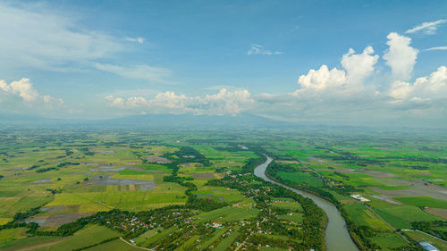 Aerial view of cityscape against sky