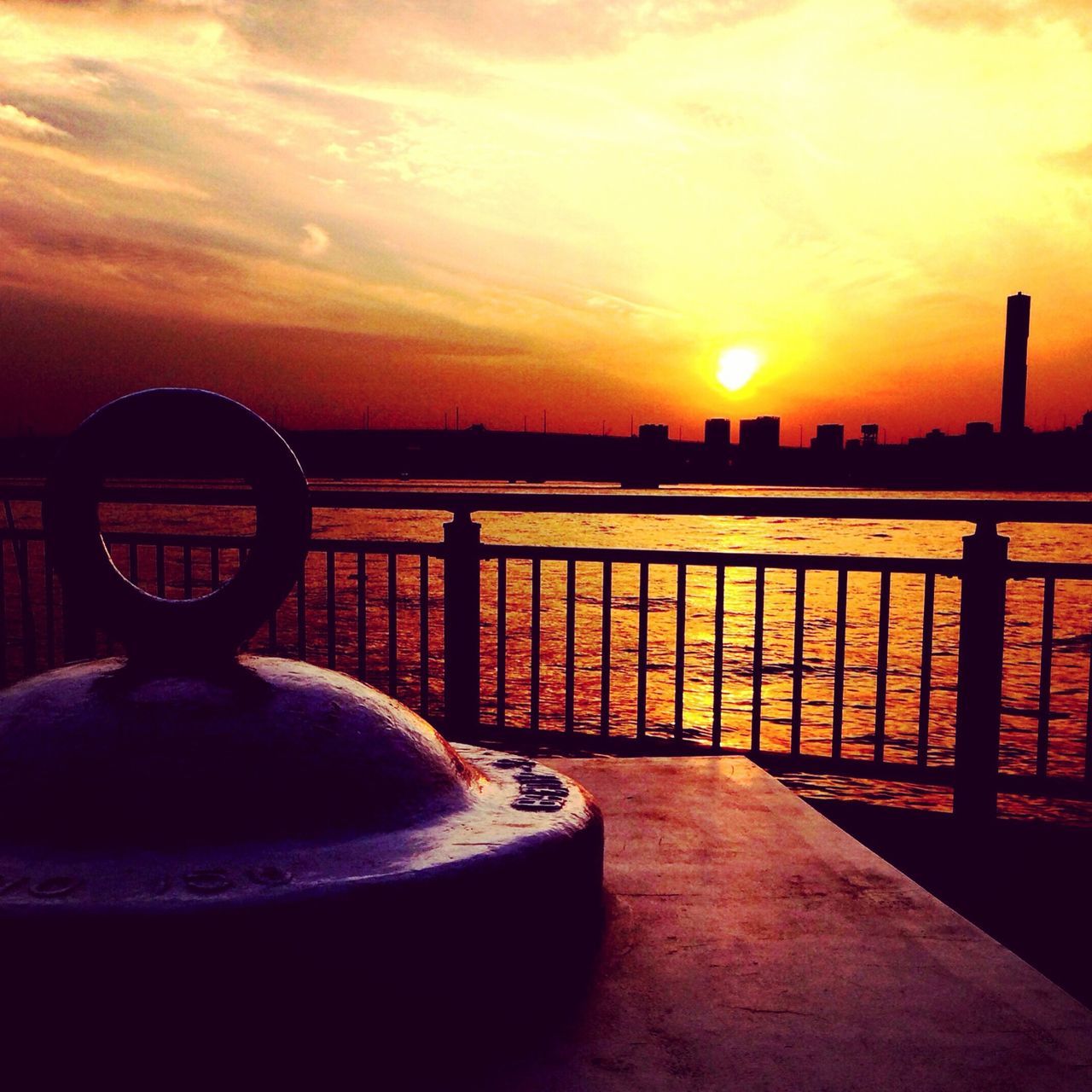 sunset, orange color, sky, sun, silhouette, cloud - sky, transportation, reflection, railing, water, built structure, nature, sunlight, beauty in nature, architecture, scenics, outdoors, cloud, tranquility, no people