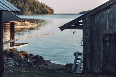 Pier on lake against sky