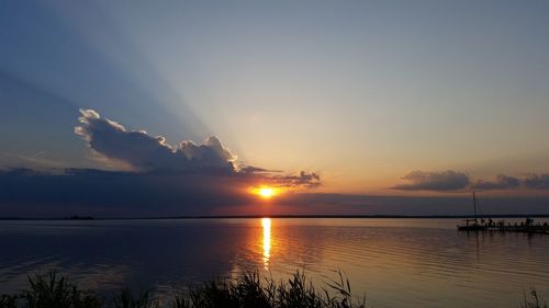 Scenic view of sunset over river