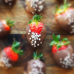 High angle view of strawberries on table