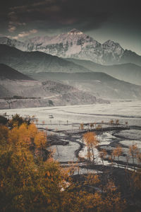 Scenic view of lake against sky during autumn