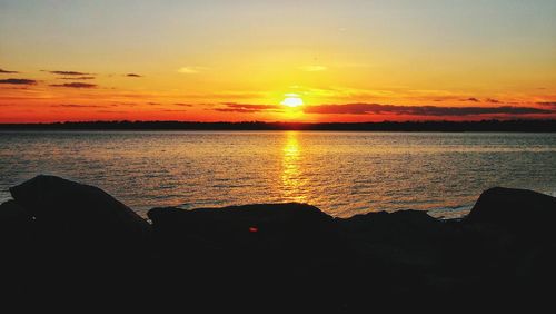 Scenic view of sunset over sea