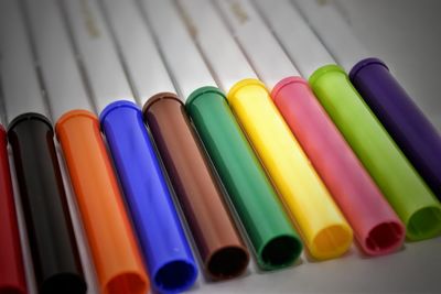 High angle view of colorful felt tip pens on table