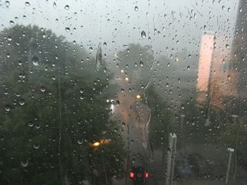 Full frame shot of wet window in rainy season