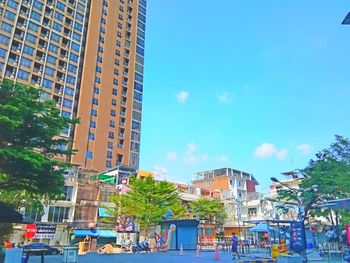 Low angle view of skyscrapers against sky