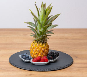 Pineapple on table