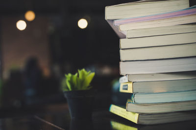 Close-up of books stacked on table