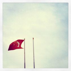 Close-up of poles against sky