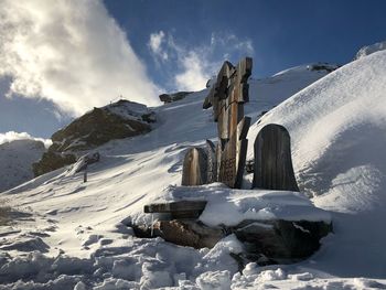 Scenic view of snow covered mountain against sky