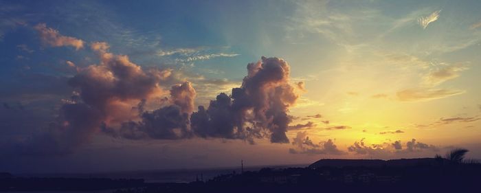 Panoramic view of sea against sky during sunset