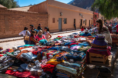 People at market stall