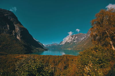 Scenic view of lake against sky during autumn