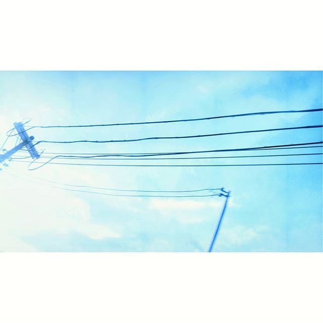 low angle view, power line, power supply, electricity, fuel and power generation, electricity pylon, cable, technology, connection, blue, sky, transfer print, auto post production filter, power cable, day, no people, outdoors, clear sky, pole, nature