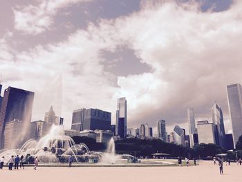 Panoramic view of modern buildings in city against sky