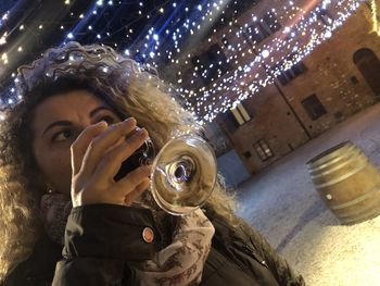 Portrait of mature man drinking glass