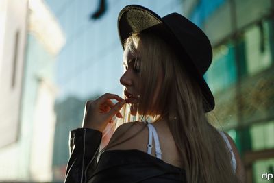 Portrait of woman holding ice cream