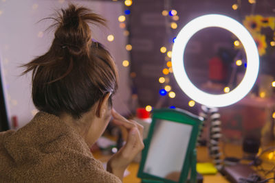 Portrait of woman using mobile phone