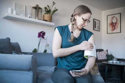 Woman checking blood pressure