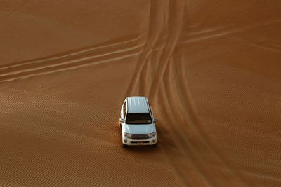 High angle view of car moving on road