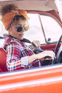 Portrait of woman in car