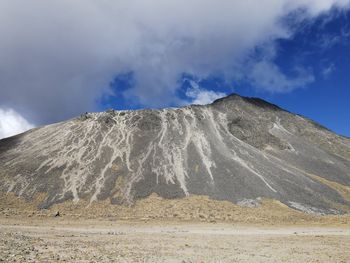 Panoramic view of volcanic landscape against sky