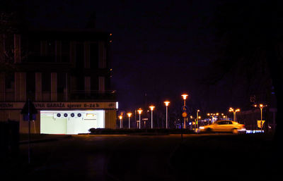 Illuminated buildings in city at night