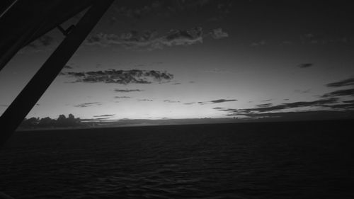 Scenic view of sea against sky at sunset