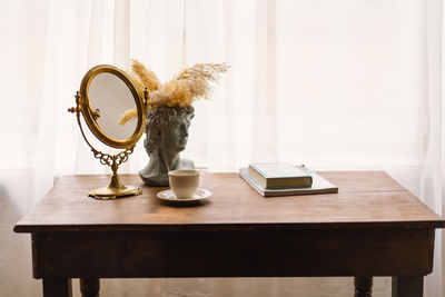 Potted plant on table at home