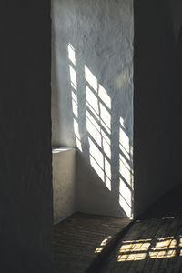 Sunlight falling on wall of building