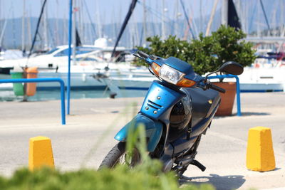 Toy car on sea shore during sunny day