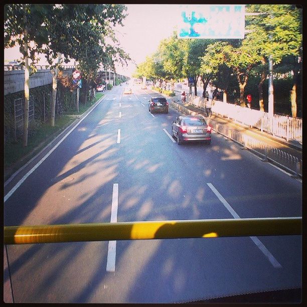 transportation, car, mode of transport, land vehicle, transfer print, road marking, road, auto post production filter, street, tree, on the move, the way forward, traffic, travel, diminishing perspective, city, outdoors, sky, sunlight, day