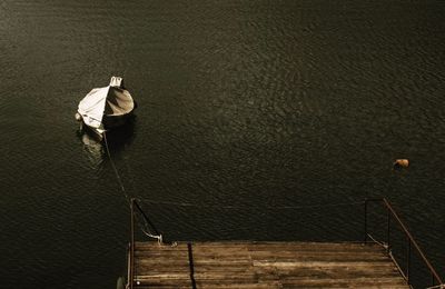 High angle view of boat moored on lake