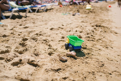 High angle view of toy on sand