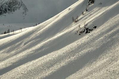 High angle view of people on snowcapped mountain