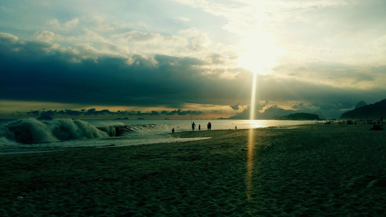 water, sea, sky, sun, scenics, beach, tranquil scene, beauty in nature, sunbeam, tranquility, sunset, cloud - sky, shore, nature, horizon over water, sunlight, leisure activity, idyllic, lifestyles