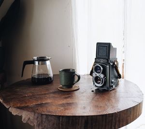 Close-up of camera on table