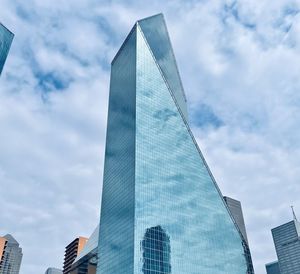 Low angle view of modern buildings against sky