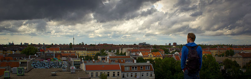 Panoramic view of buildings and city against sky
