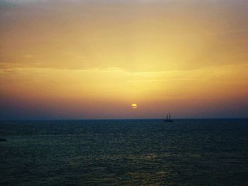 Scenic view of sea at sunset