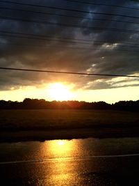 Scenic view of sunset over river